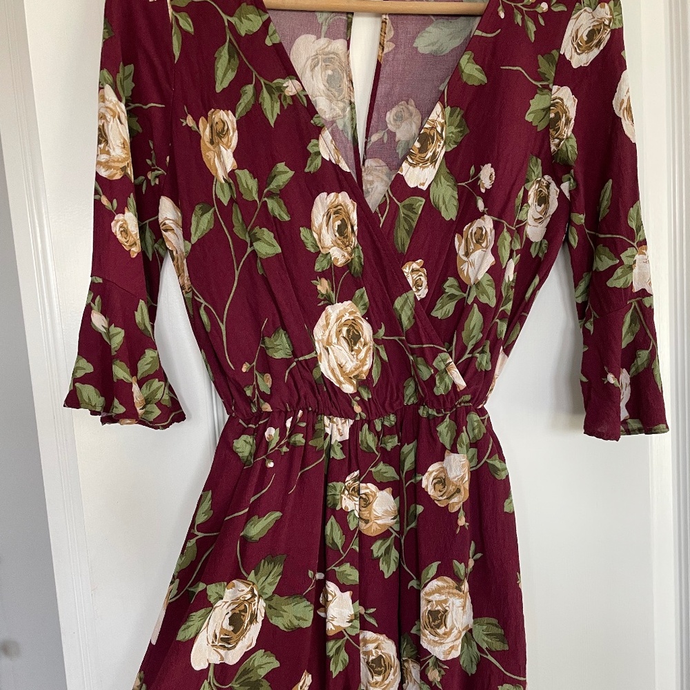Lightweight floral romper with open back in Small